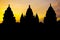 Silhouettes of Prambanan temple at sunset