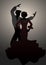 Silhouettes of Spanish couple flamenco dancers.