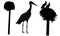 Silhouettes of stork bird, nest, set. Vector illustration