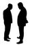 silhouettes of two men standing and talking