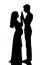 Silhouettes of two people men and a pregnant woman