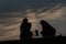 Silhouettes of two women and a child