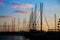 Silhouettes of yachts in a bay at sunset