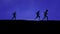 Silhouettes of young people running