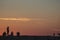 Silhouettes of of young people at sea jetty