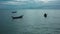 Silhoutte of fisherman boats in the sea at sunset