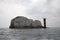 Silhoutte of the Needles lighthouse Isle of Wight and a chalk rock