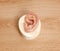 Silicone Human Ear on Wooden Table