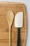 Silicone Spatula and Wooden Spoon on Wooden Cutting Board