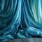 Silk cloth flowing on digital background in teal colors.