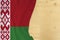 Silk colored national flag of Belarus, blank wooden blank for text, concept of tourism, travel, emigration, global business,