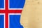 Silk colored national flag of Iceland country, empty wooden mocap for text, concept of tourism, travel, emigration, global