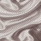 Silk fabric texture with geometric pattern. Many irregular folds. Abstract background best for luxury desing.