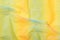 Silk fabric transparent. Yellow twisted twirl fabric multicolour texture