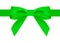 Silk green ribbon with a beautiful knot on a white background. Can be used for the design of gifts, postcards, congratulations.