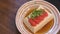 Silk Japanese tofu, Japanese soft cold tofu with sauce in a ceramic dish on dining wooden table.