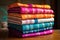 silk saree folded in a stack with vibrant colors