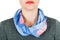 Silk scarf. Blue silk scarf around her neck on white background.