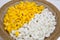Silkworm cocoon yellow and white in basket for textiles handmade