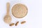 Silkworm Pupae Bombyx Mori powder. Insects flour for eating as food items made of cooked insect meat in bowl and spoon on white