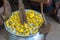 Silkworms nest in white dish and use for silk fabric