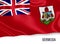 Silky flag of Bermuda waving on an isolated white background.