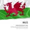 Silky flag of Wales waving on an isolated white background with the white text area for your advert message.