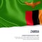 Silky flag of Zambia waving on an isolated white background with the white text area for your advert message.