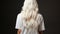 Silky platinum blonde hair cascading down a woman\\\'s back