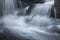 Silky, turbulent water of a small waterfall in Hebron, Connecticut