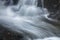 Silky, turbulent water of a small waterfall in Hebron, Connecticut