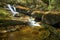 Silky water of Salroc Falls in New Hampshire`s White Mountains.