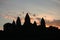 Sillhouette of the Angkor Wat main temple during a sunset