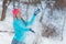 Silly girl playing with snow