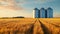 Silos stand tall in a wheat field, symbolizing the storage of agricultural abundance. Agriculture concept. Ai Generated