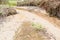 Silt eroding along creek