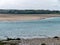 Silt on the exposed seabed at low tide. The shallow sea bay. Seaside