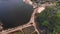 Silt fields geometric pattern on riverbank aerial panorama