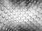 Silver abstract embossed dot background