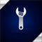 Silver Adjustable wrench icon isolated on dark blue background. Vector