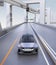 Silver autonomous car driving on the highway