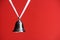 Silver Bell on Red