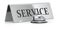 Silver bell with service sign