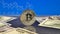 Silver bitcoin on blue abstract finance background. Bitcoin cryptocurrency.
