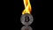 Silver bitcoin coin catches fire on an isolated black background. Slow motion 250fps.