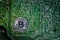 Silver Bitcoins on the chip. The green background. Crypt Of Safety