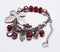 Silver butterfly bracelet with red gems