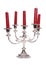 Silver candelabra with red candles cut out