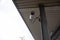 Silver CCTV Camera. Protection security system watching people