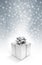 Silver celebration gift boxe on snow background